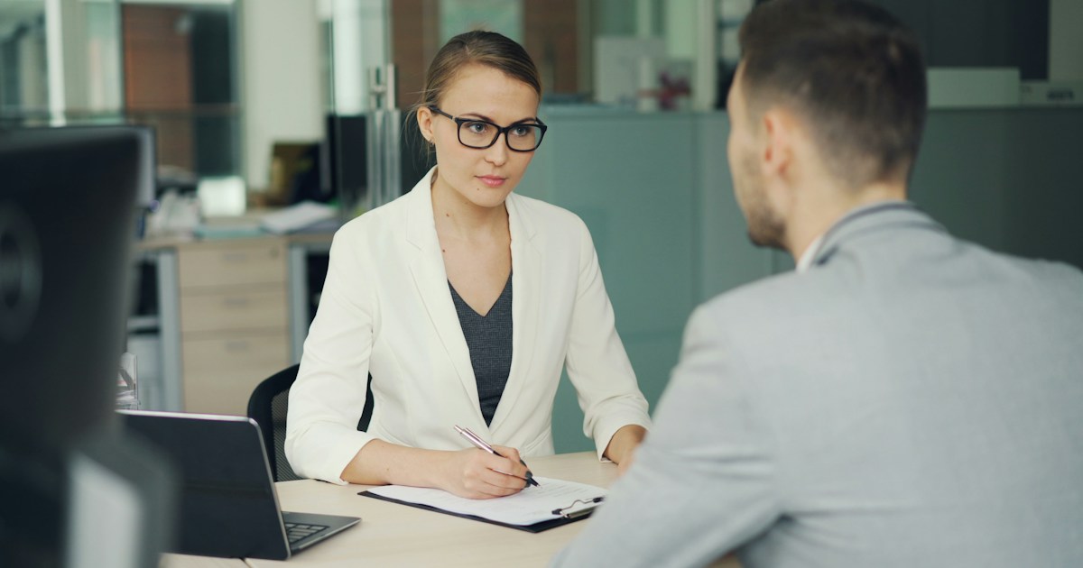 An interviewer discussing an opportunity with a candidate